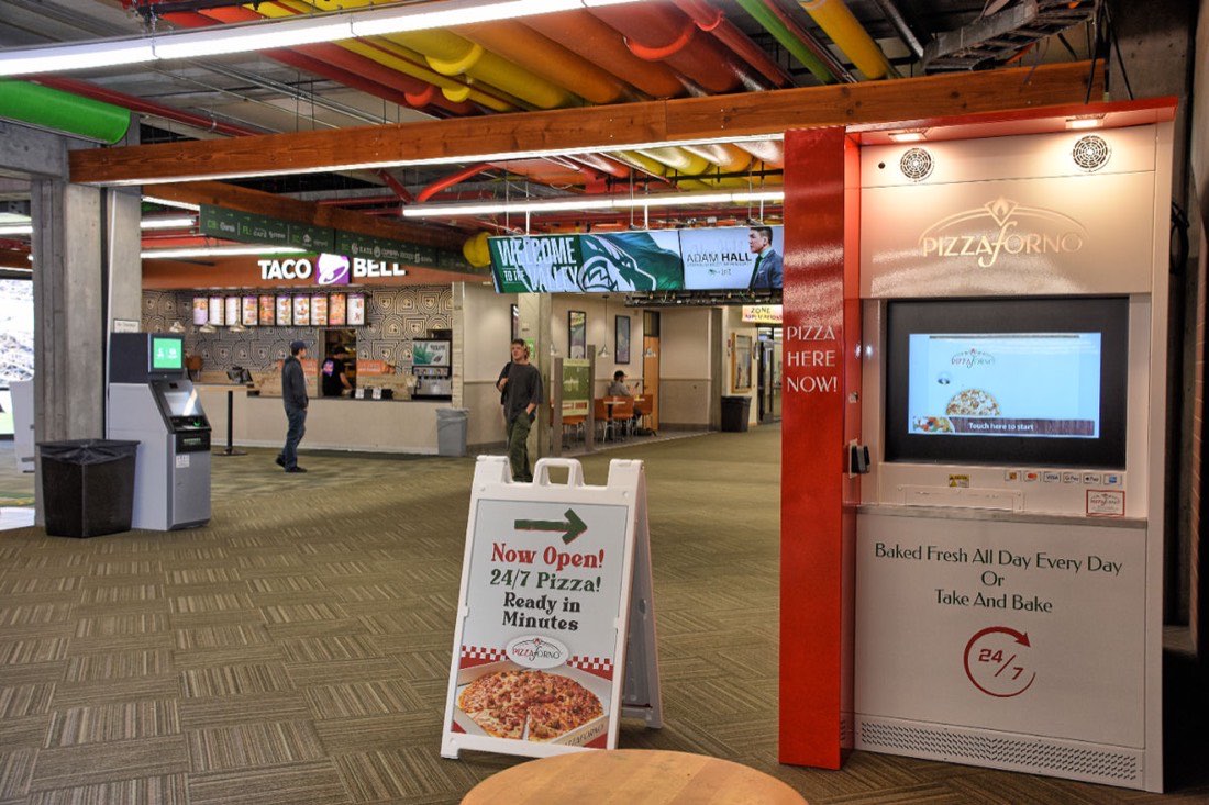 An automated pizza oven installed indoors